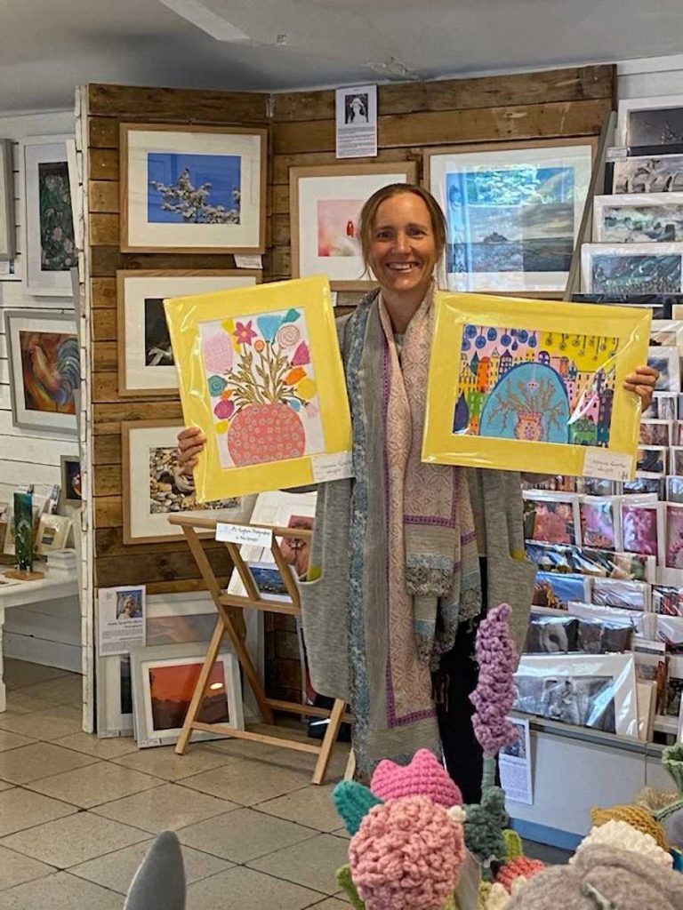 Mel with her artwork